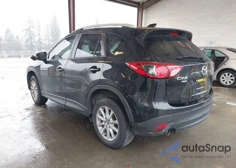 2014 Mazda Cx-5 Touring z USA, uszkodzony, nr VIN JM3KE4CY6E0378017